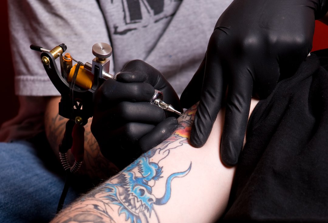 NMT For Muscle Pain After Tattoo Sessions